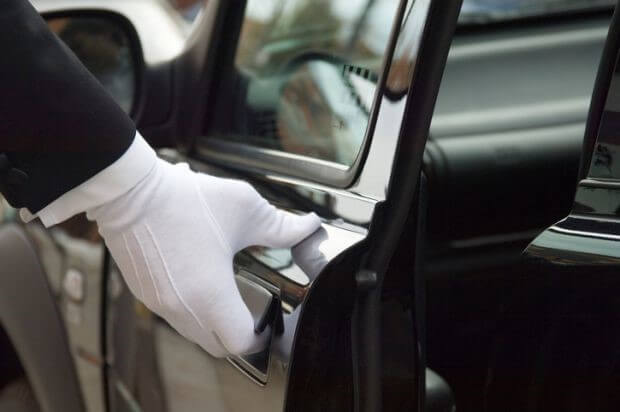 chauffeur white glove opening door-1.jpg
